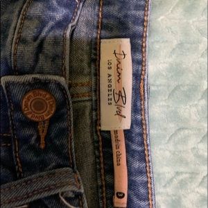 blue ripped denim jeans